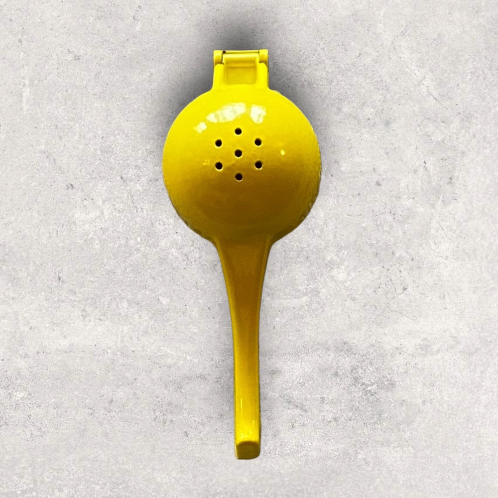 Metal hand held Lemon press. Fruit press. Great condition!